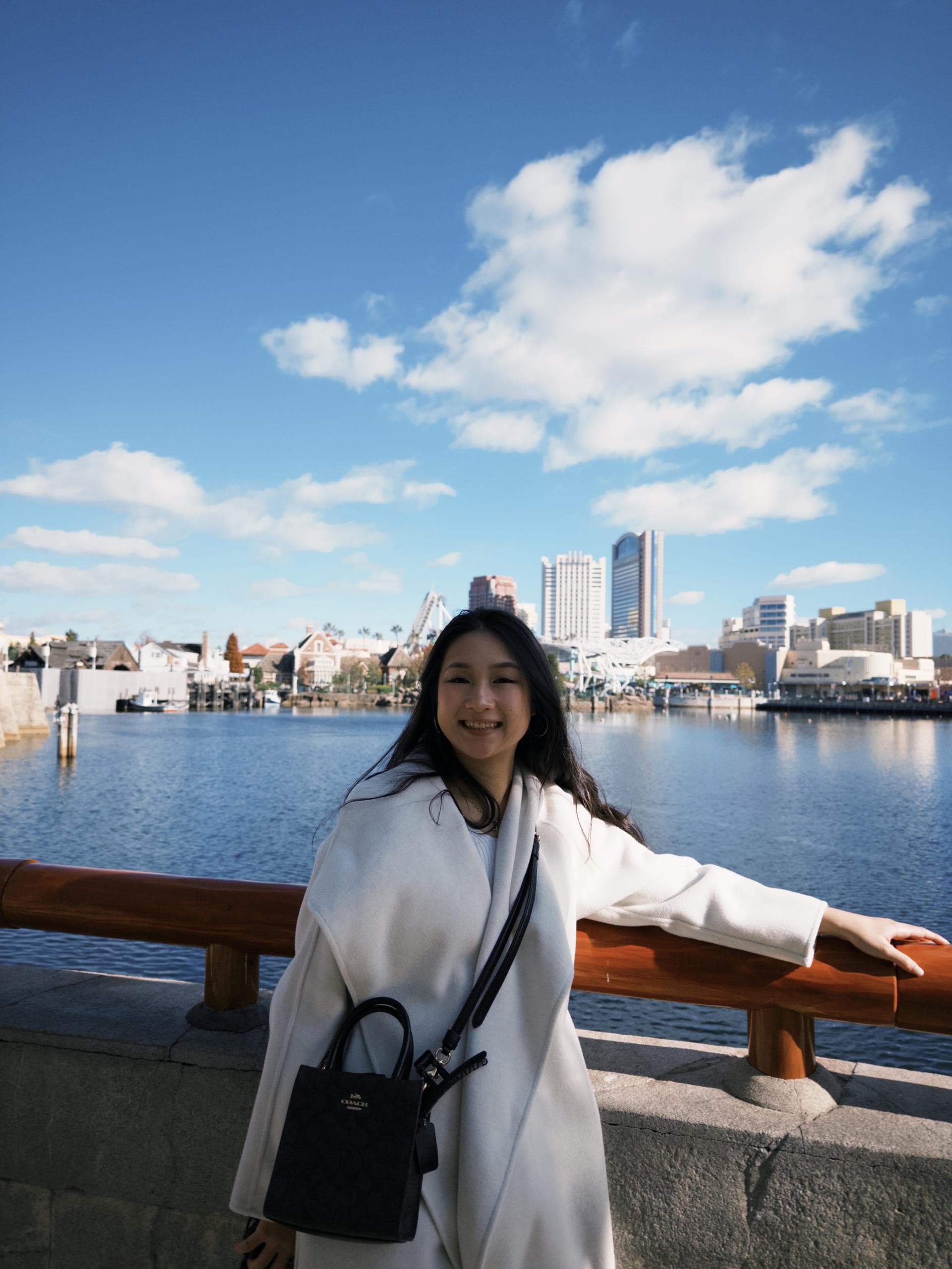 Jewel Lai smiling by the waterfront